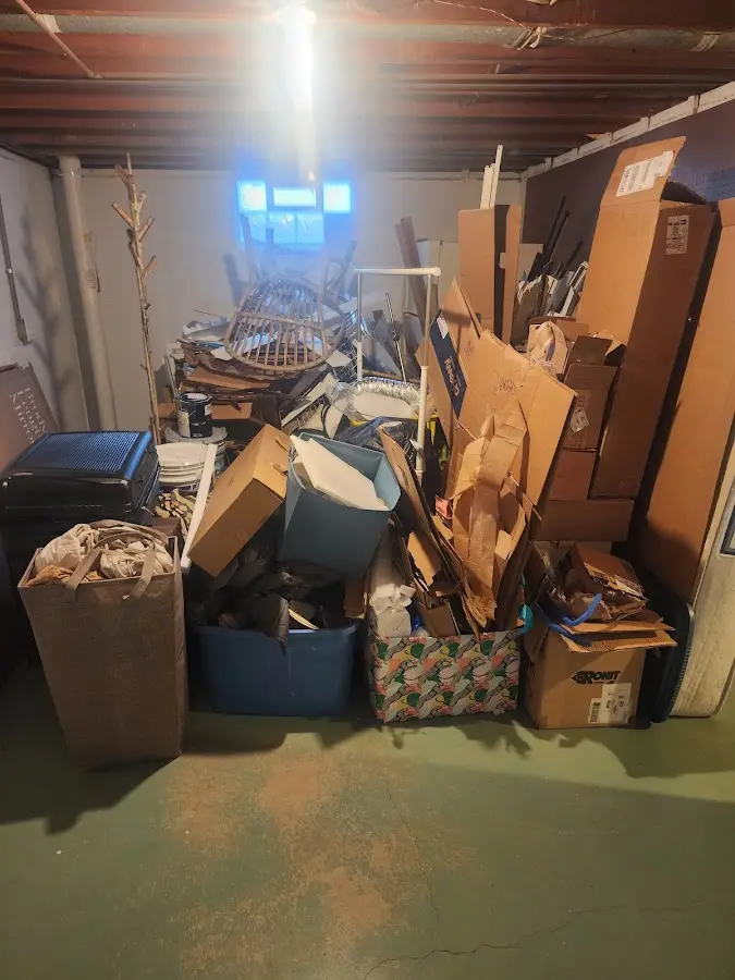 Roll-off dumpster container at job site for Yard Waste Dumpster Rental in Worcester